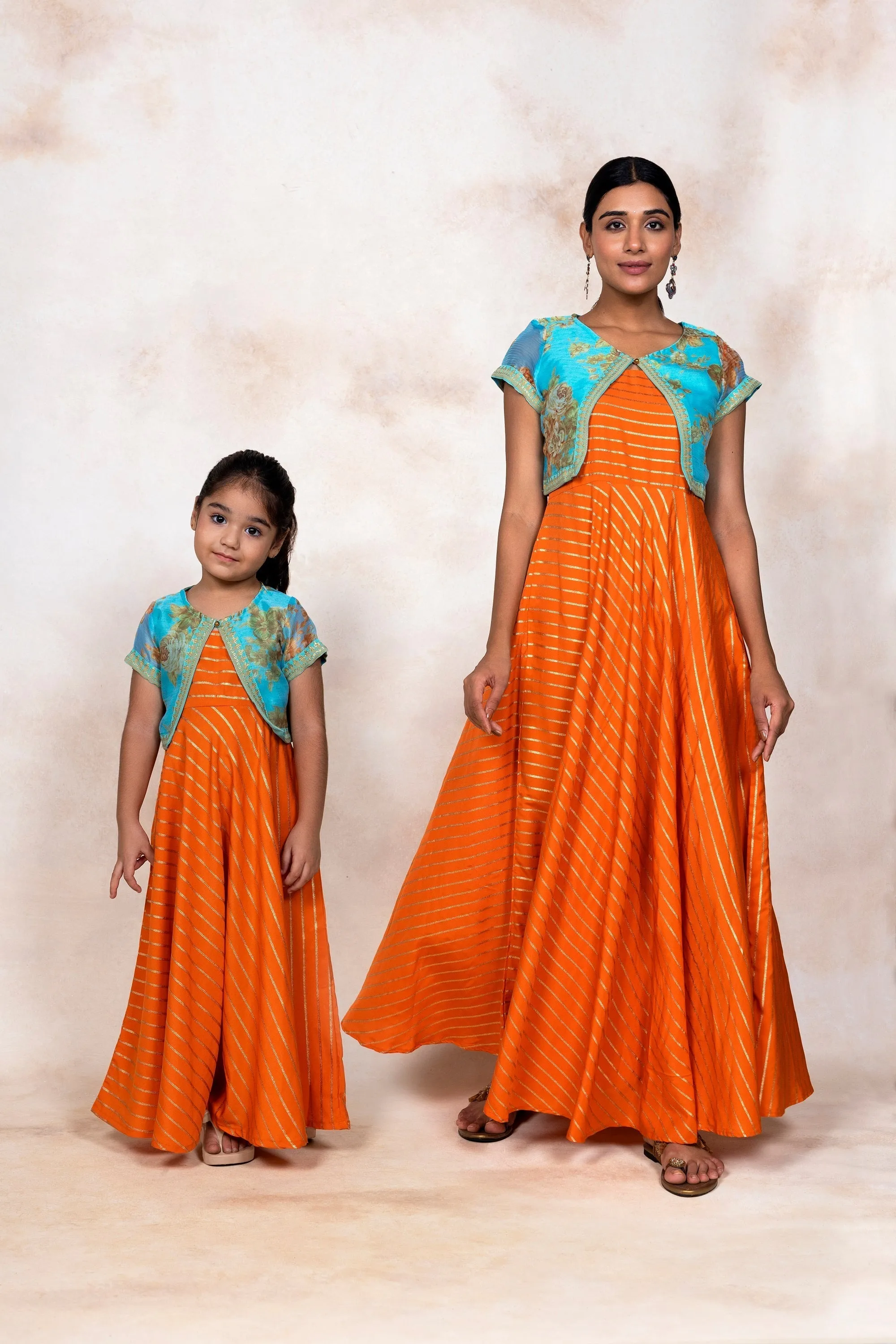 Orange Striped Curved Kurta Sets